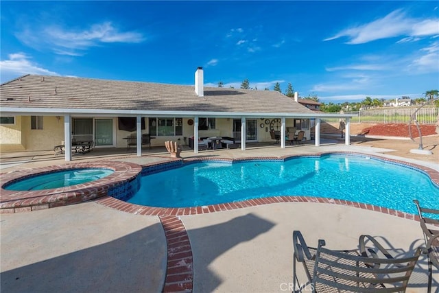 15605 Terraceview Ct, Riverside, CA 92504 - view of pool featuring a patio, fence, and a pool with connected hot tub