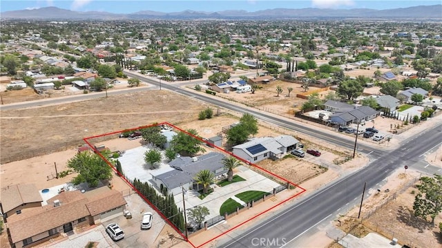 15074 Willow St, Hesperia, CA 92345 - aerial view of residential area featuring a mountainous background and property boundaries highlighted