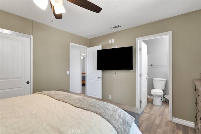 15074 Willow St, Hesperia, CA 92345 - bedroom featuring light wood finished floors, ceiling fan, baseboards, ensuite bath, and a closet