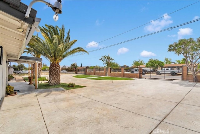 15074 Willow St, Hesperia, CA 92345 - view of patio with a gate and fence