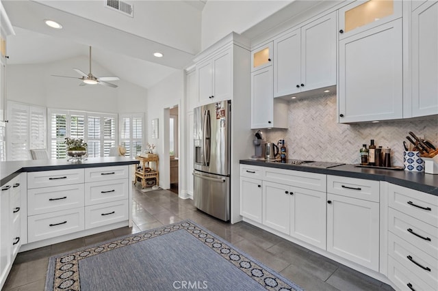 45 Northampton Ct, Newport Beach, CA 92660 - kitchen featuring stainless steel fridge, a ceiling fan, dark countertops, black electric cooktop, and white cabinets