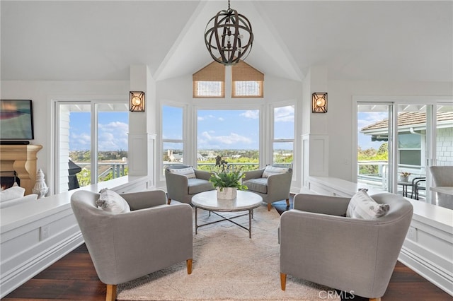 45 Northampton Ct, Newport Beach, CA 92660 - living room with a decorative wall, wood finished floors, wainscoting, a lit fireplace, and high vaulted ceiling