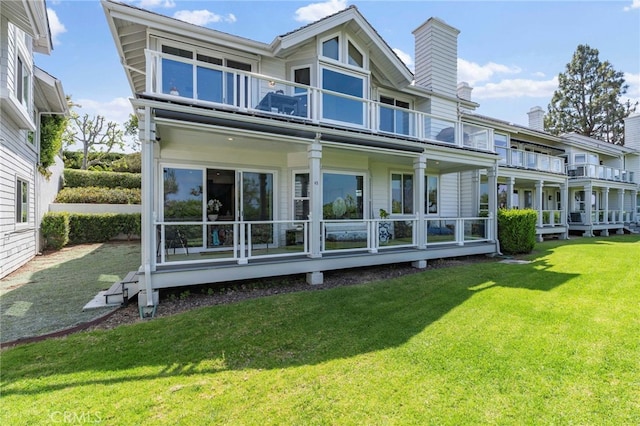 45 Northampton Ct, Newport Beach, CA 92660 - rear view of house with a balcony and a lawn