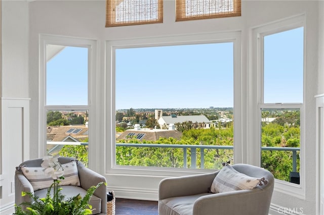 45 Northampton Ct, Newport Beach, CA 92660 - sunroom / solarium featuring wood finished floors, healthy amount of natural light, and a high ceiling
