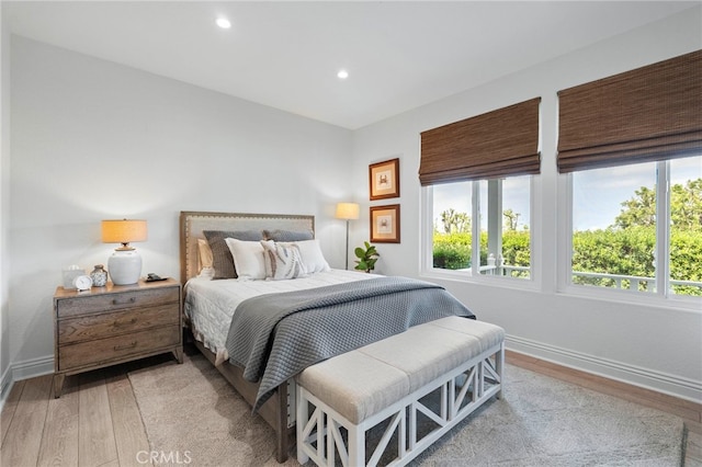 45 Northampton Ct, Newport Beach, CA 92660 - bedroom with multiple windows, light wood-style floors, baseboards, and recessed lighting