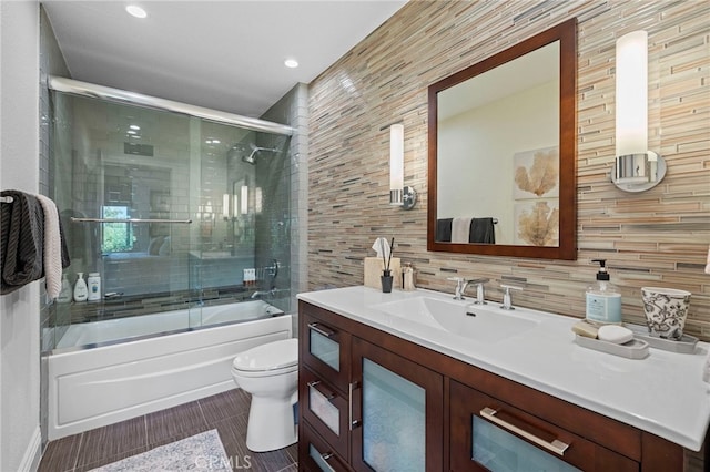45 Northampton Ct, Newport Beach, CA 92660 - full bath featuring toilet, combined bath / shower with glass door, tile walls, wood finished floors, and vanity