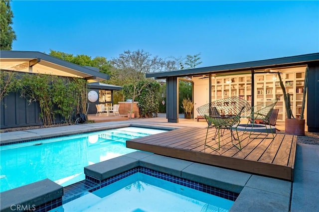 3137 Lees Ave, Long Beach, CA 90808 - view of pool with a deck, a ceiling fan, and a pool with connected hot tub
