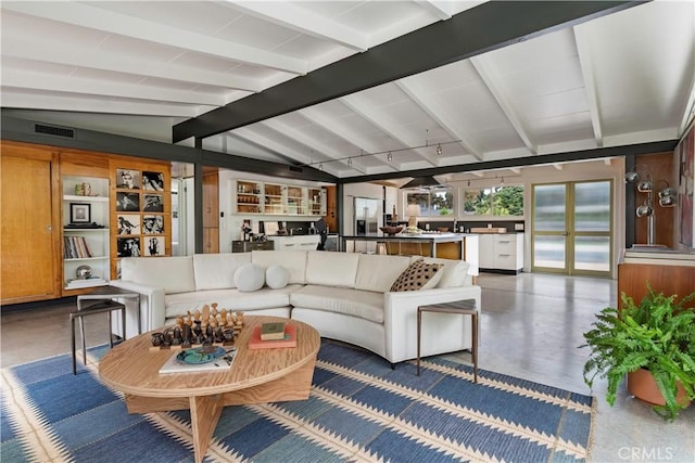 3137 Lees Ave, Long Beach, CA 90808 - living area featuring finished concrete flooring