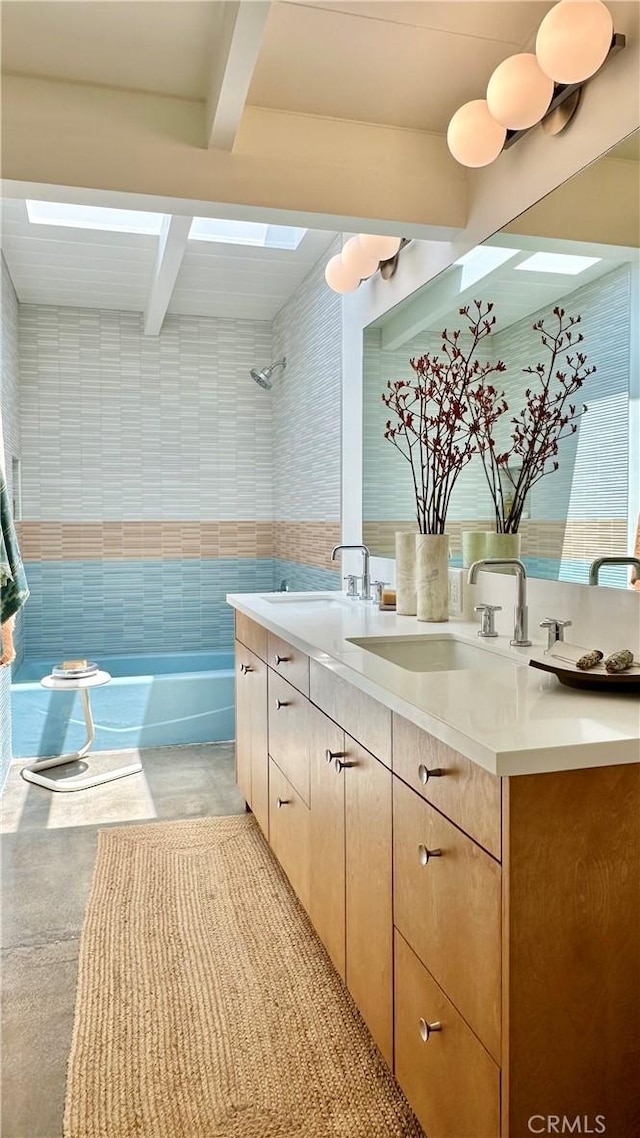 3137 Lees Ave, Long Beach, CA 90808 - full bathroom featuring beamed ceiling, double vanity, shower / washtub combination, and tile walls