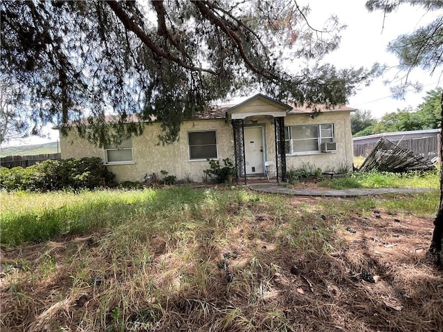 4004 N 3rd Ave, San Bernardino, CA 92407 - view of front of property with stucco siding and cooling unit
