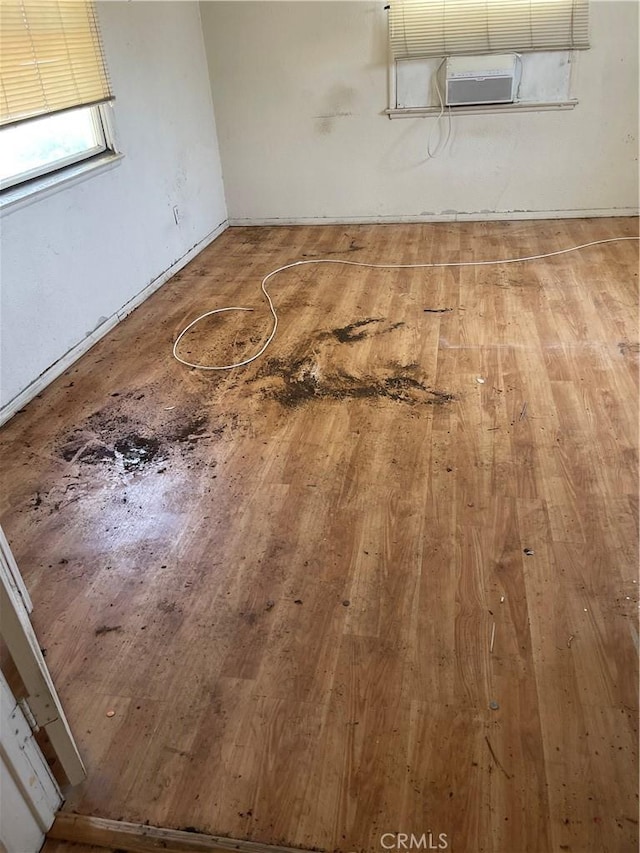 4004 N 3rd Ave, San Bernardino, CA 92407 - empty room with wood-type flooring and cooling unit