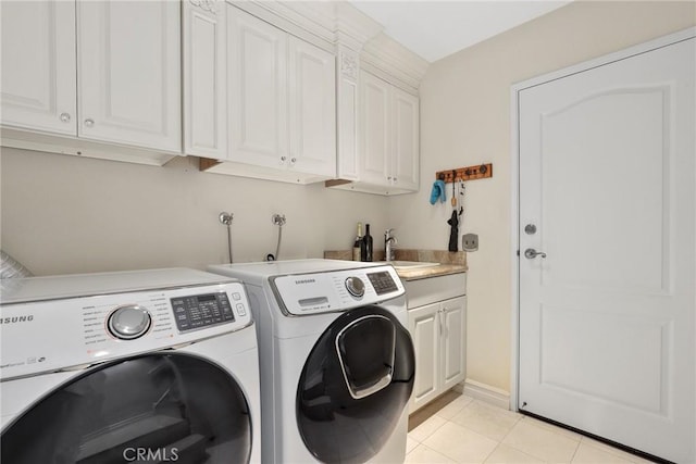 2800 Plaza Del Amo 458, Torrance, CA 90503 - clothes washing area with washing machine and dryer, cabinet space, and light tile patterned floors