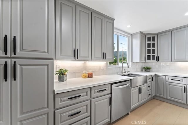420 W Bennett Ave, Glendora, CA 91741 - kitchen with gray cabinets, dishwasher, a sink, backsplash, and recessed lighting