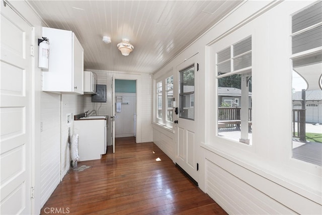 128 E Navilla Pl, Covina, CA 91723 - kitchen featuring white cabinetry and dark wood-type flooring