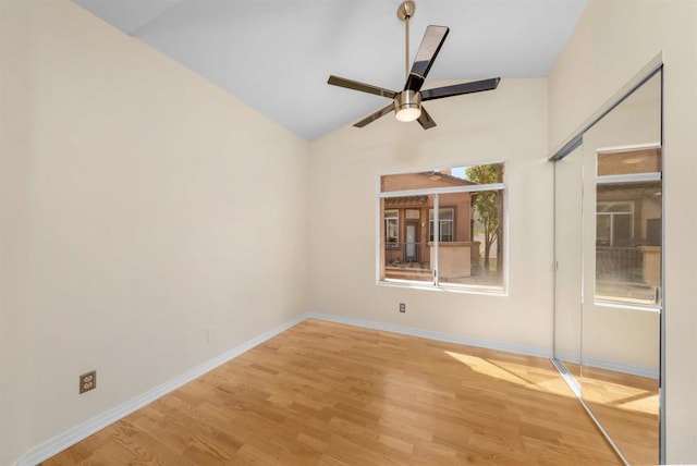 11354 Via Rancho San Diego Unit J, El Cajon, CA 92019 - unfurnished room with wood finished floors, baseboards, a ceiling fan, and vaulted ceiling