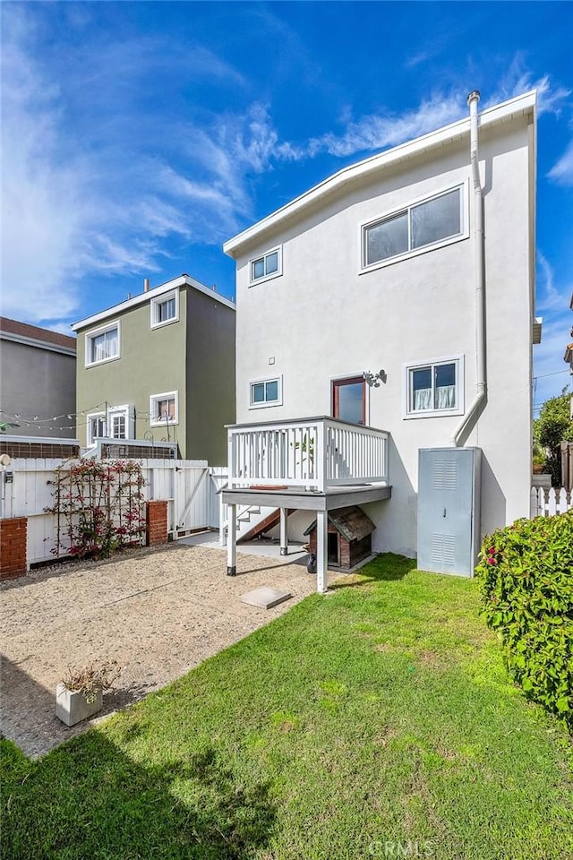 1517 Steinhart Ave, Redondo Beach, CA 90278 - rear view of property featuring a deck, stucco siding, and a gate