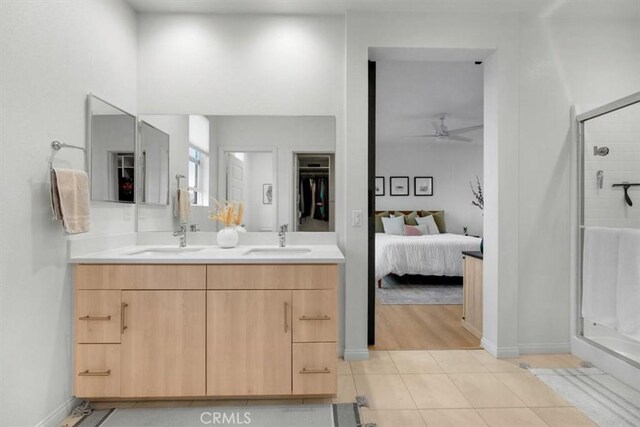 10243 Graphite St, Spring Valley, CA 91977 - bathroom with a stall shower, a ceiling fan, baseboards, and connected bathroom