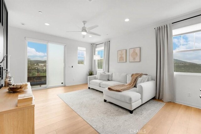 10243 Graphite St, Spring Valley, CA 91977 - living area featuring a ceiling fan, light wood-type flooring, recessed lighting, and baseboards