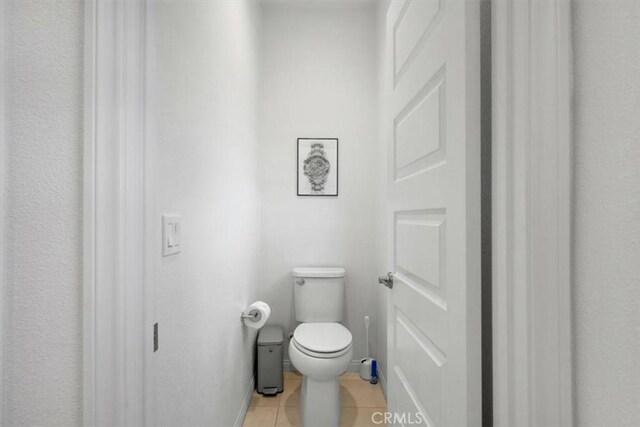 10243 Graphite St, Spring Valley, CA 91977 - bathroom with tile patterned flooring, toilet, and baseboards