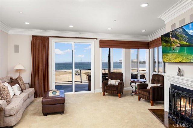 1400 E Ocean Blvd Unit 1201, Long Beach, CA 90802 - living area featuring a glass covered fireplace, light carpet, ornamental molding, and recessed lighting