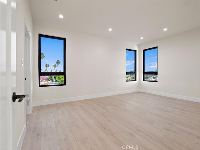 3810 Locke Ave, Los Angeles, CA 90032 - spare room with plenty of natural light, light wood-style flooring, recessed lighting, and baseboards