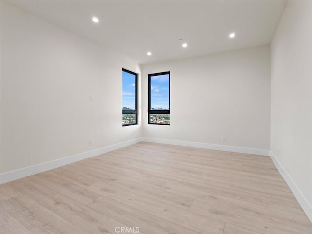 3810 Locke Ave, Los Angeles, CA 90032 - spare room featuring light wood-style floors, recessed lighting, and baseboards
