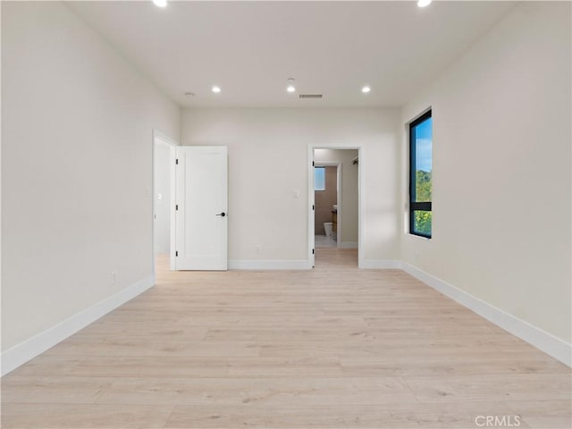 3810 Locke Ave, Los Angeles, CA 90032 - unfurnished room with recessed lighting, light wood-style flooring, and baseboards