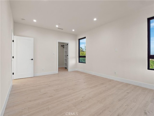 3810 Locke Ave, Los Angeles, CA 90032 - empty room featuring light wood-type flooring, recessed lighting, and baseboards