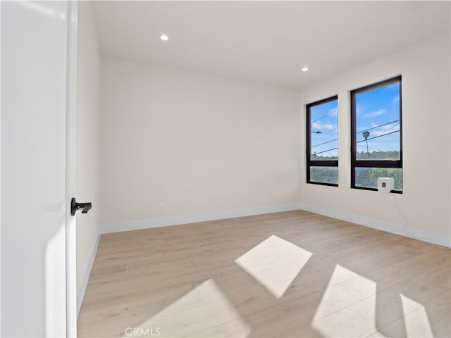 3810 Locke Ave, Los Angeles, CA 90032 - spare room with light wood-type flooring, recessed lighting, and baseboards