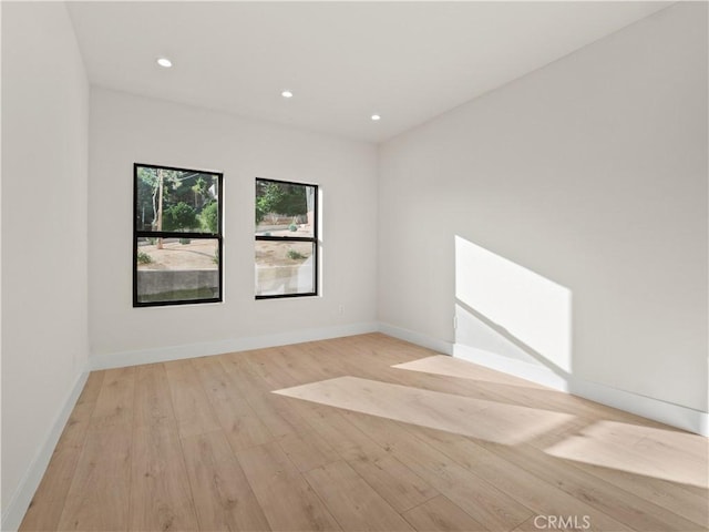 3810 Locke Ave, Los Angeles, CA 90032 - spare room with light wood-style flooring, recessed lighting, and baseboards