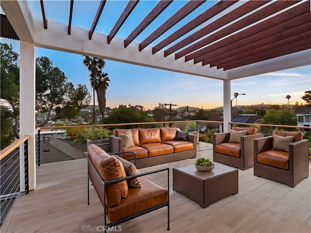3810 Locke Ave, Los Angeles, CA 90032 - deck at dusk with an outdoor hangout area and a pergola