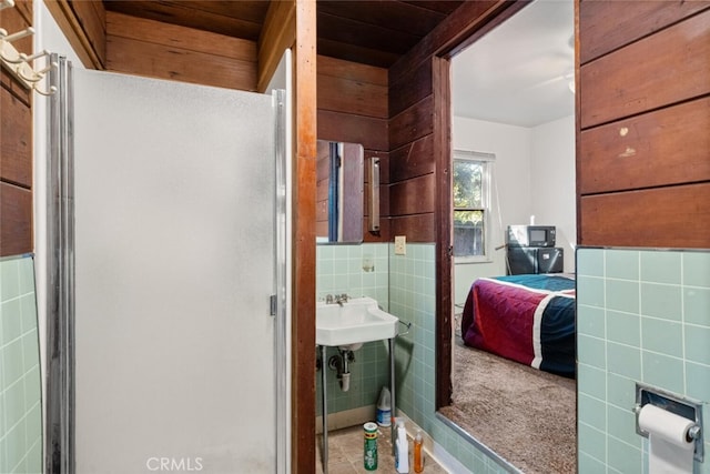 1256 Warner St, Chico, CA 95926 - bathroom featuring tile walls and a sink