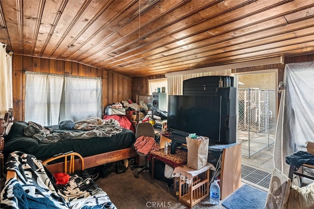 1256 Warner St, Chico, CA 95926 - bedroom featuring wooden ceiling, wood walls, access to exterior, and carpet floors