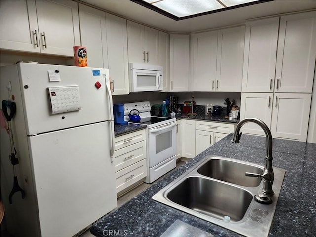 10407 Larwin Ave, Chatsworth, CA 91311 - kitchen with white appliances, a sink, and white cabinets