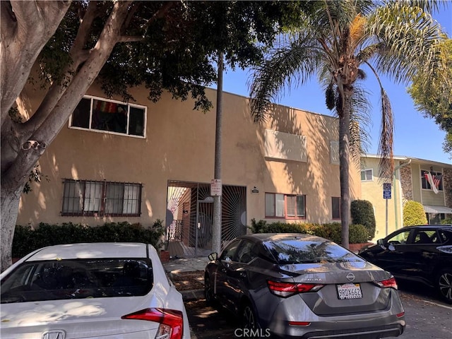 925 E Appleton St Unit 4, Long Beach, CA 90802 - view of property featuring uncovered parking