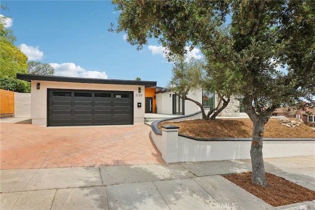 2105 Noble View Dr, Rancho Palos Verdes, CA 90275 - view of front of home with stucco siding, decorative driveway, and a garage