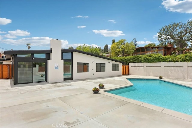 2105 Noble View Dr, Rancho Palos Verdes, CA 90275 - view of swimming pool with a patio area and fence