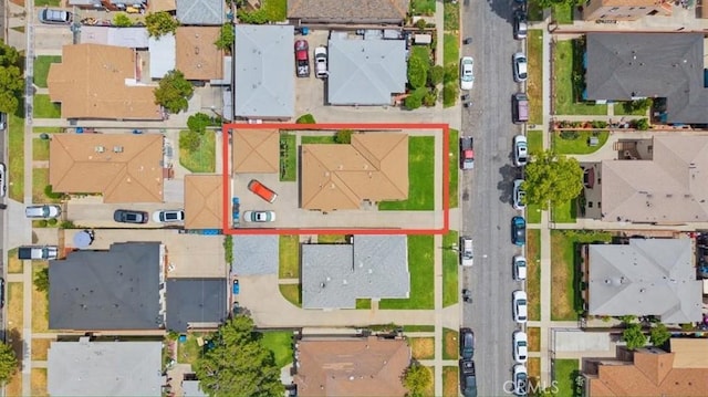aerial view of residential area featuring property parcel outlined