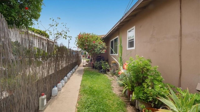 view of yard with fence