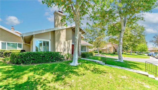 5855 Via Sonora Unit 39, Yorba Linda, CA 92887 - view of front of property featuring stucco siding and a front yard