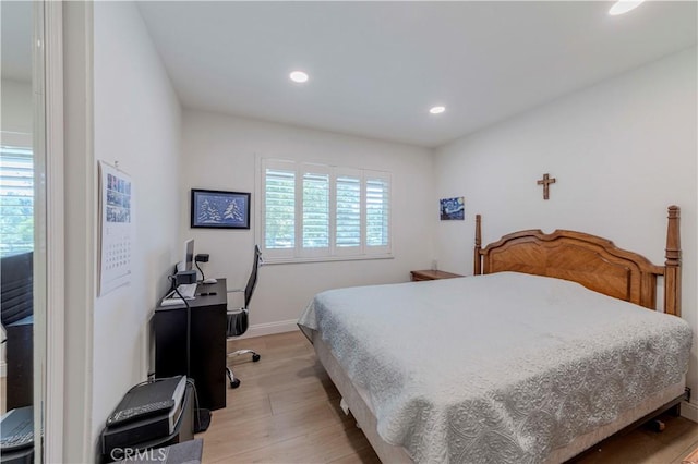5855 Via Sonora Unit 39, Yorba Linda, CA 92887 - bedroom with light wood finished floors, recessed lighting, baseboards, and an office area