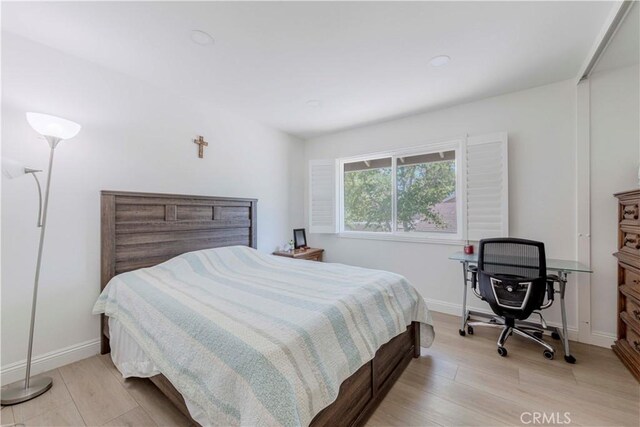5855 Via Sonora Unit 39, Yorba Linda, CA 92887 - bedroom featuring light wood-type flooring, recessed lighting, and baseboards