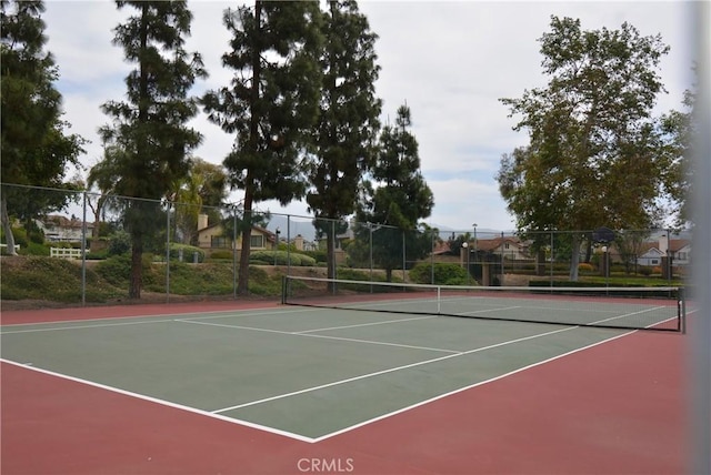 5855 Via Sonora Unit 39, Yorba Linda, CA 92887 - view of tennis court featuring community basketball court and fence