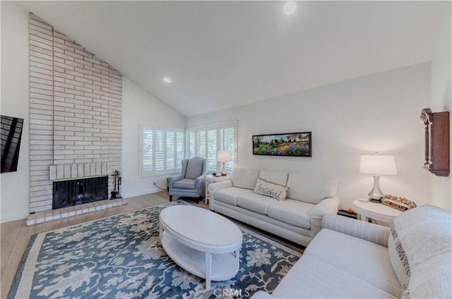5855 Via Sonora Unit 39, Yorba Linda, CA 92887 - living area featuring lofted ceiling, light wood-type flooring, a fireplace, baseboards, and recessed lighting