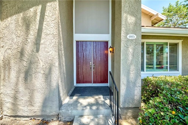 5855 Via Sonora Unit 39, Yorba Linda, CA 92887 - view of exterior entry featuring stucco siding