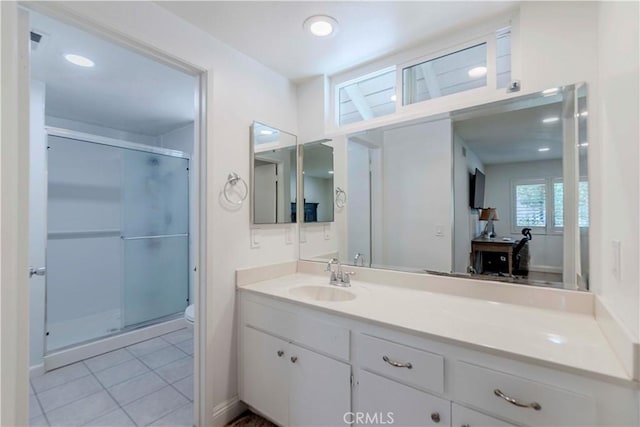 5855 Via Sonora Unit 39, Yorba Linda, CA 92887 - bathroom featuring a shower stall, vanity, toilet, tile patterned floors, and recessed lighting