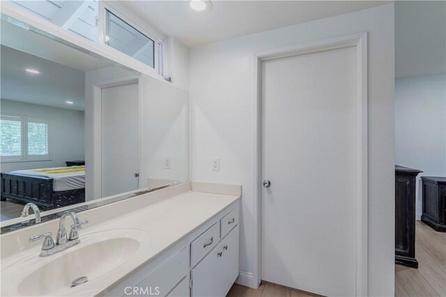 5855 Via Sonora Unit 39, Yorba Linda, CA 92887 - bathroom with wood finished floors, recessed lighting, and vanity