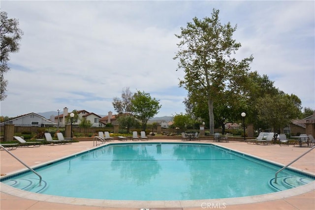 5855 Via Sonora Unit 39, Yorba Linda, CA 92887 - community pool with fence, a patio area, and a residential view