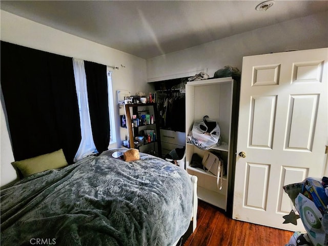1210 W Manchester Ave, Los Angeles, CA 90044 - bedroom featuring wood finished floors