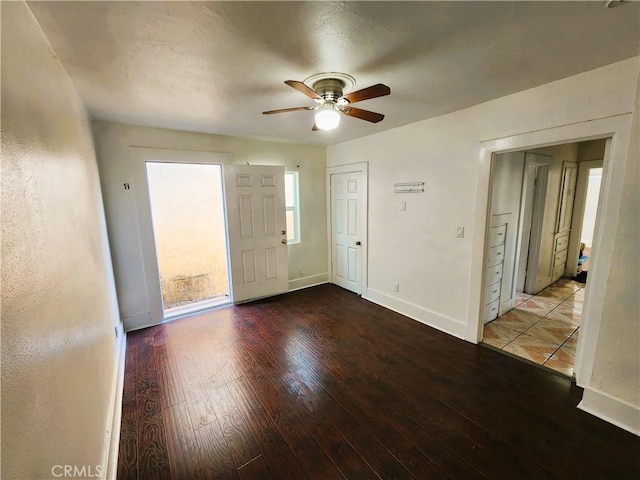 1210 W Manchester Ave, Los Angeles, CA 90044 - foyer with a ceiling fan, hardwood / wood-style floors, and baseboards